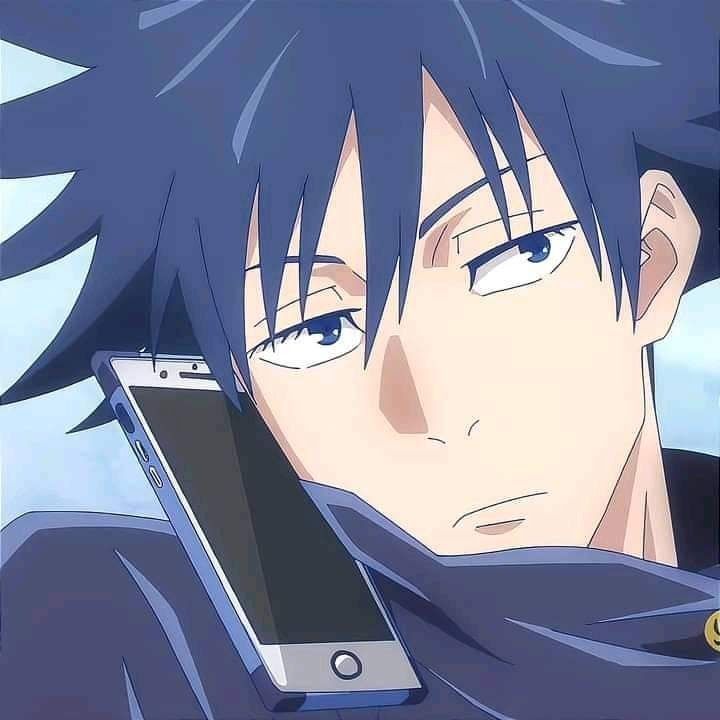 an anime character holding a cell phone in his right hand and looking at the screen