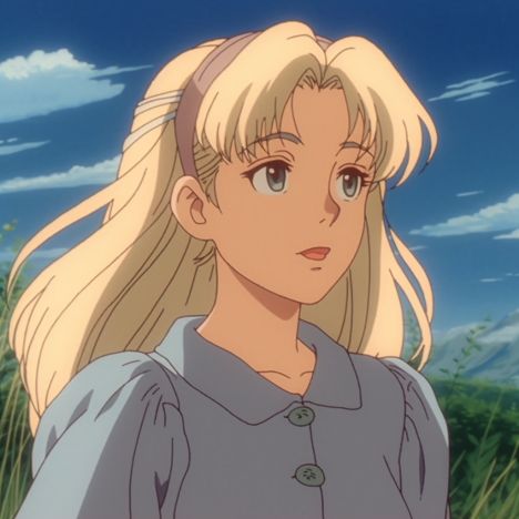 a blonde haired woman with long hair standing in the middle of tall grass and looking into the distance