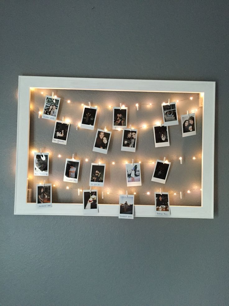 a white frame with pictures and lights on it