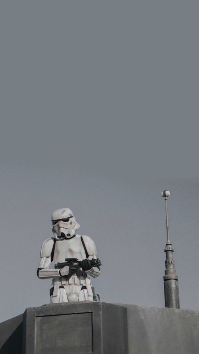 a storm trooper statue on top of a building