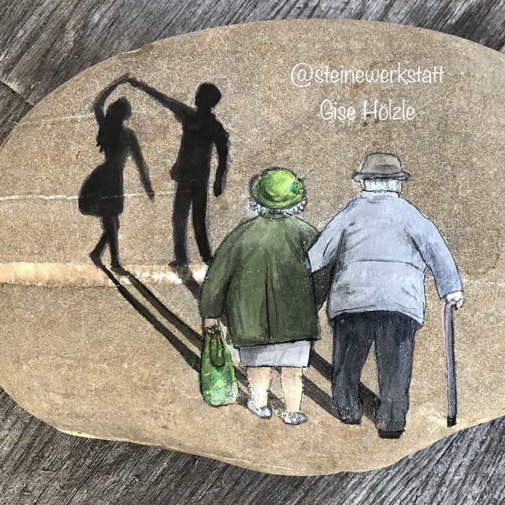 an image of three people walking down the street with their shadow on a rock that says, somewhere we are holding hands