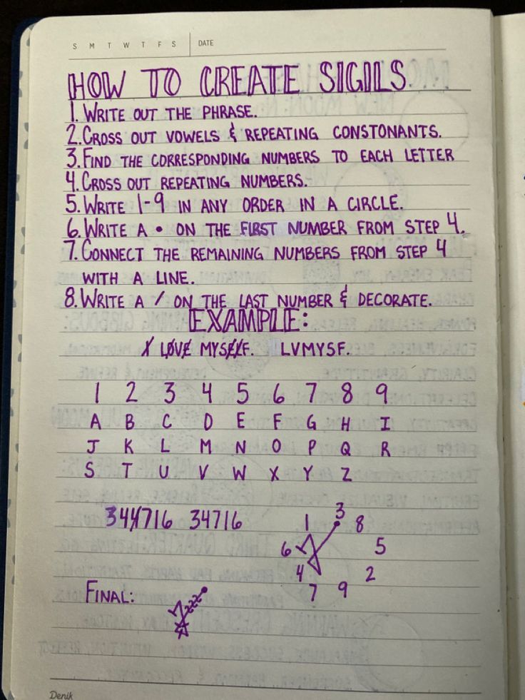 an open notebook with writing on it and numbers written in purple ink, sitting on top of a table