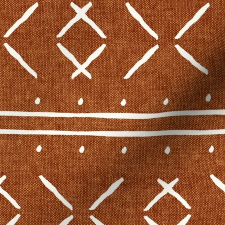 an orange and white fabric with lines on it