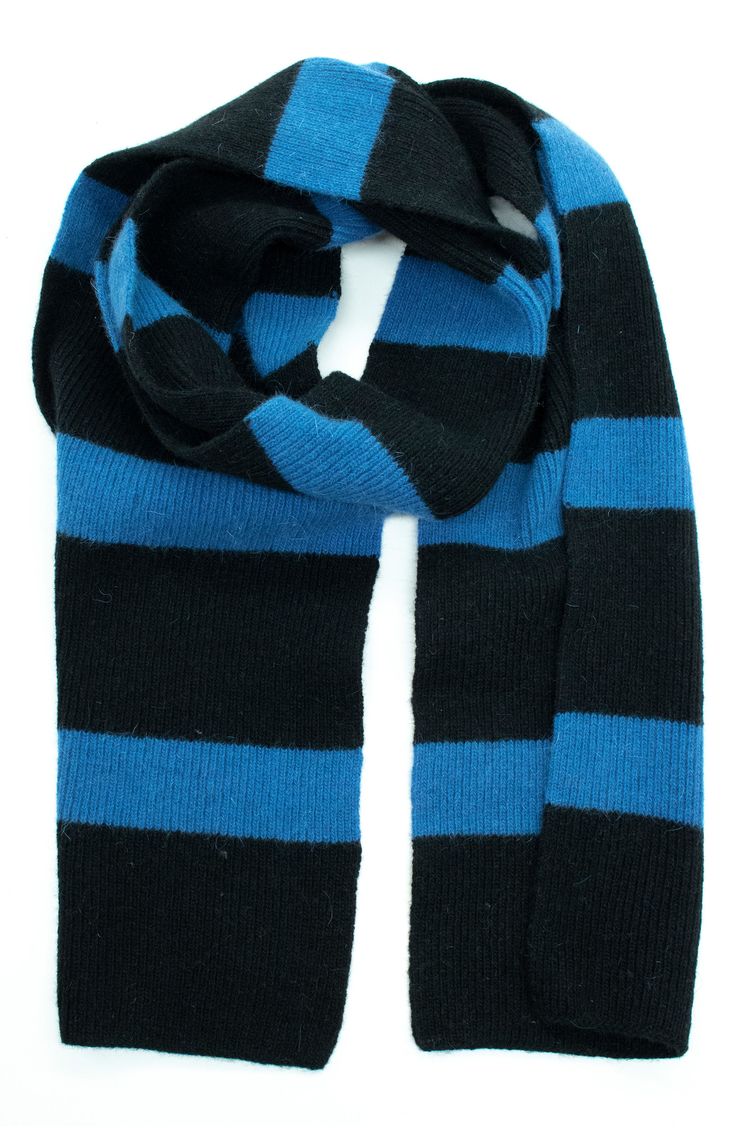 With a sporty stripe pattern, this supersoft knit scarf is essential to enduring cold weather with grace and style. 60% lambs wool, 20% nylon, 20% angora Dry clean 
 Imported Cold Weather Clothes, Stripe Scarf, Casual Black Warm Scarves, Casual Warm Black Scarves, Casual Warm Black Scarf, Casual Black Warm Scarf, Black Wool Scarves For Cold Weather, Casual Black Wool Scarf, Striped Scarves