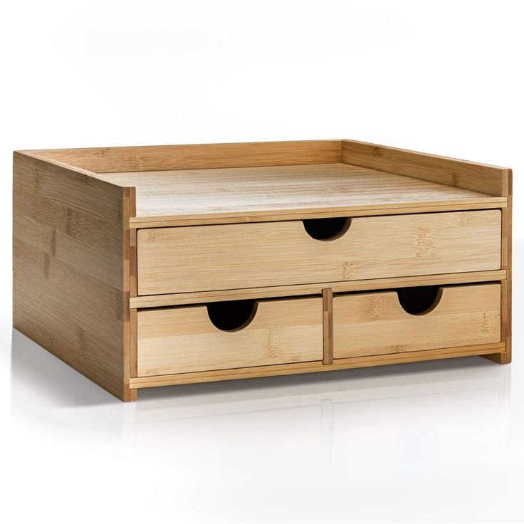 a wooden box with two drawers on the bottom and one drawer open to show what's inside