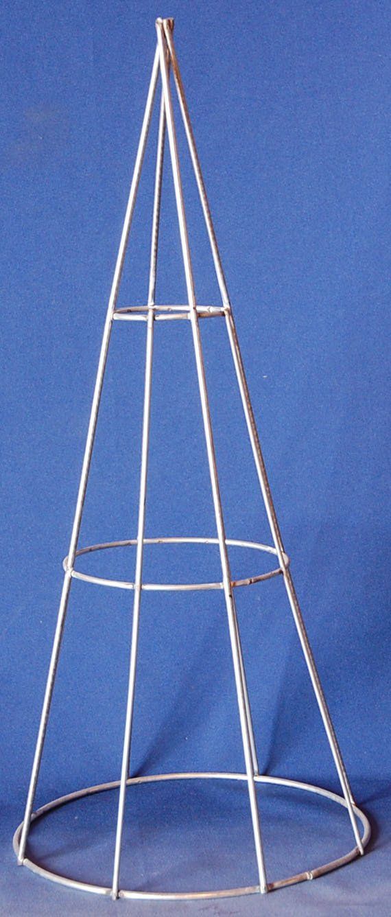 a metal triangle shaped object on top of a blue background with white trimmings