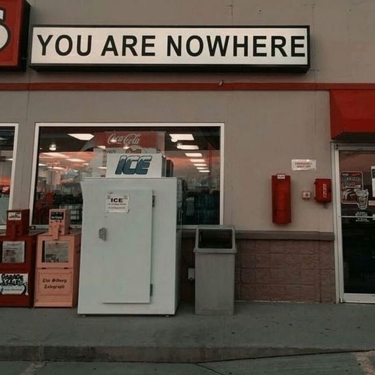 there is a store front that has an icebox on the outside and it says, you are nowhere