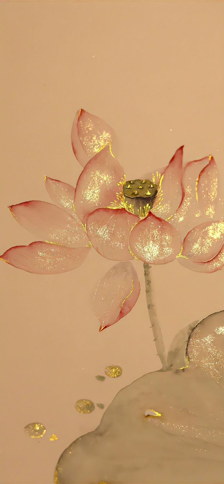 a pink flower floating in water with gold flecks on it's petals