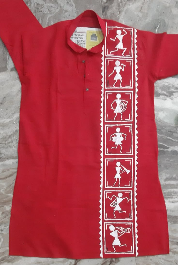 a red shirt with white designs on it