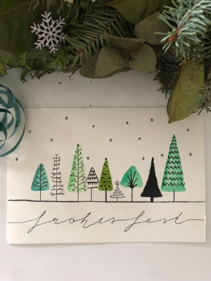 a christmas card with trees and snowflakes in the background, surrounded by greenery