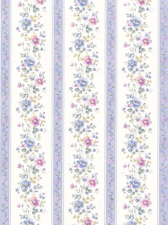 a white and blue striped wallpaper with flowers