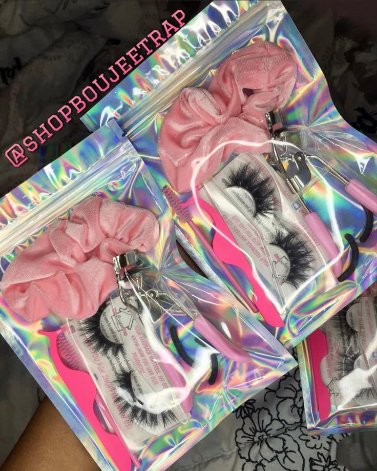 two bags with pink and white eyelashes in them