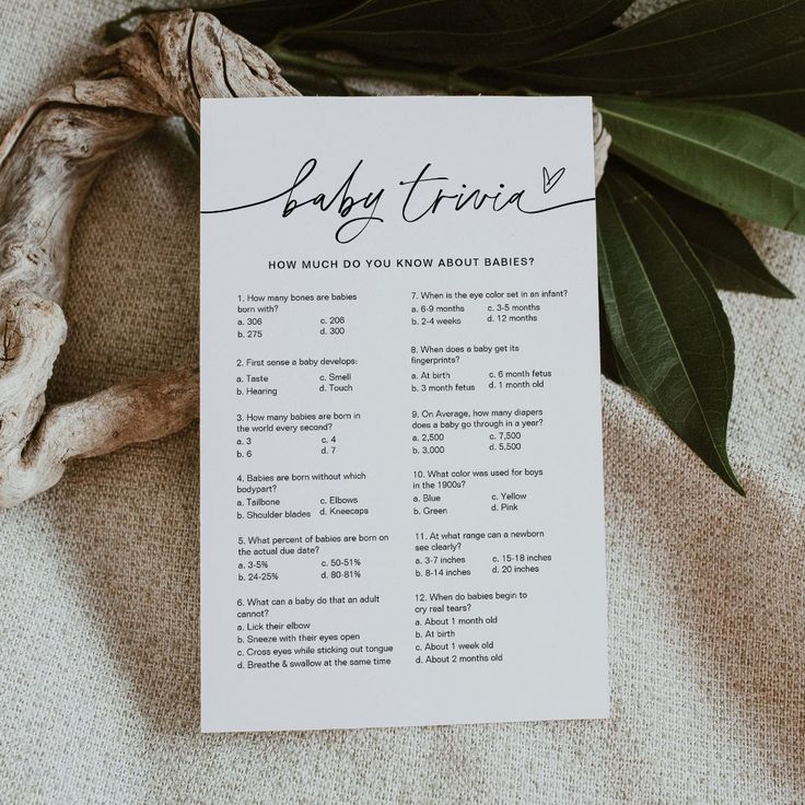 a baby shower game is shown on top of a piece of paper next to a plant