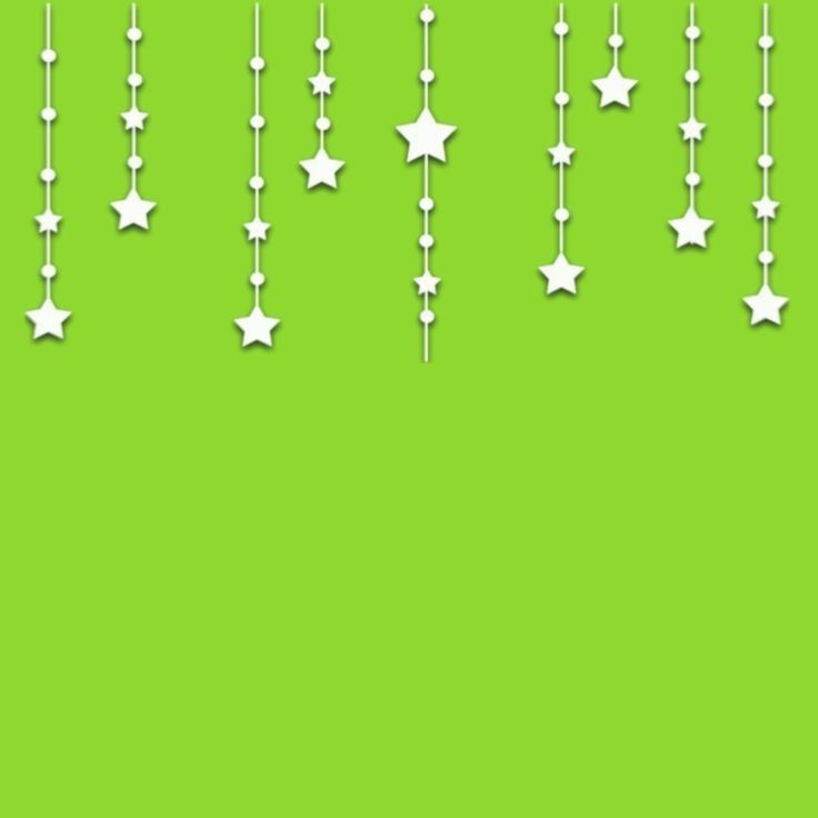 white stars hanging from strings against a green background