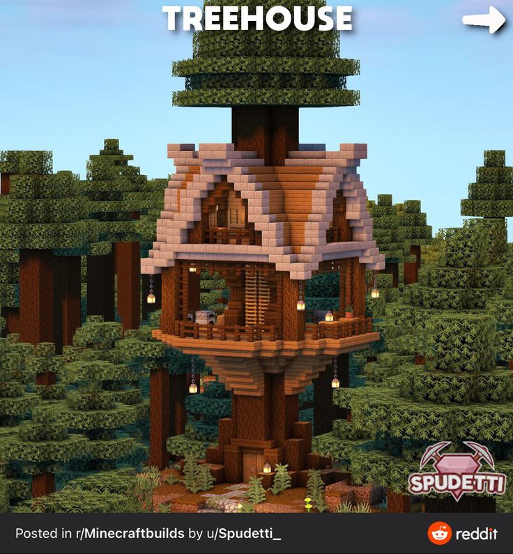 a tree house in the middle of a forest with lots of trees and bushes around it