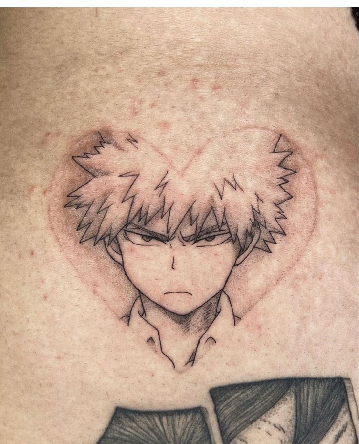 the back of a man's stomach with an anime character tattoo on it