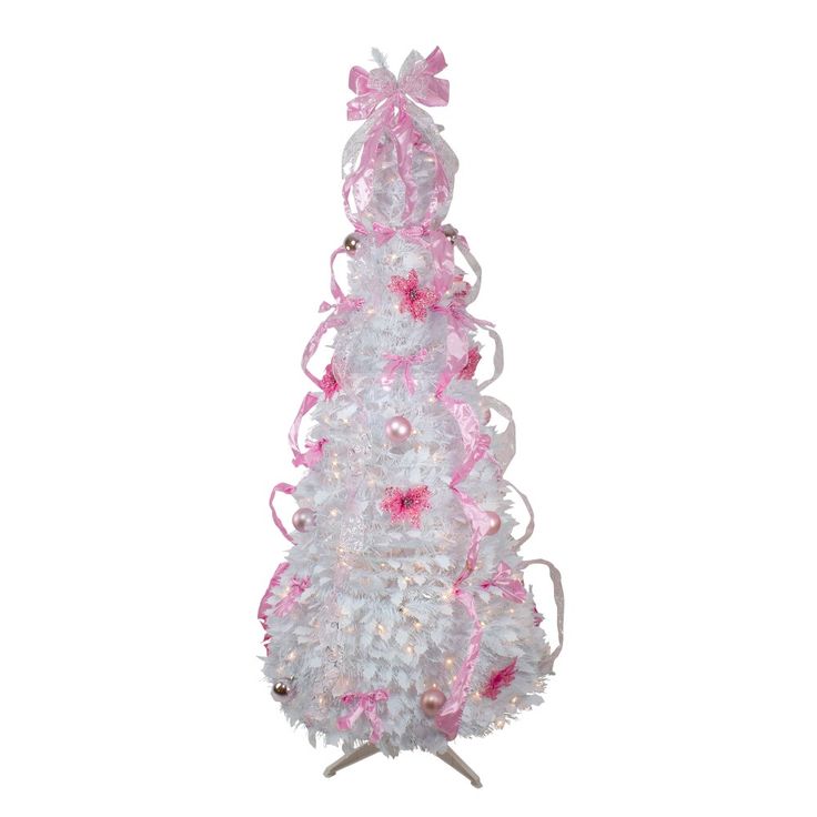 a white and pink christmas tree with bows