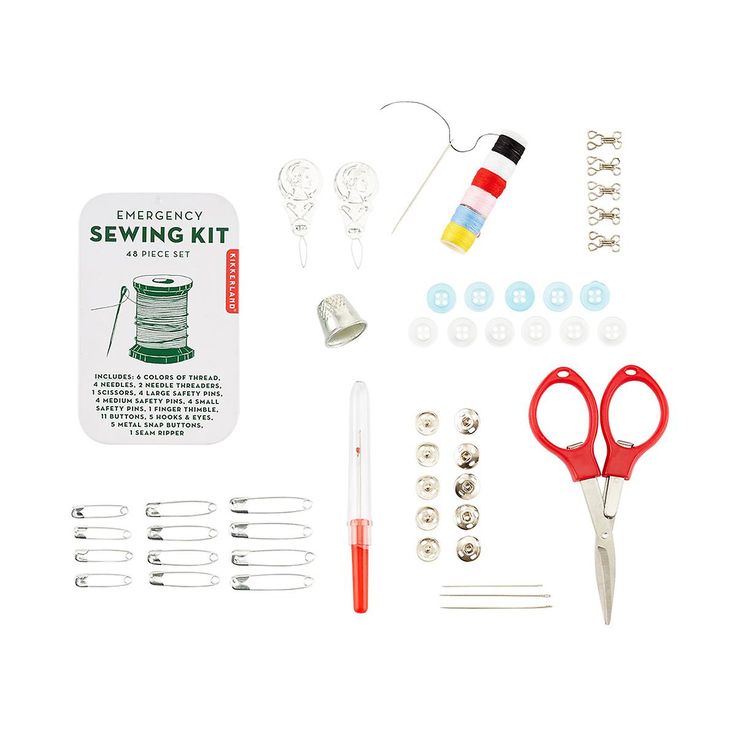 the sewing kit includes scissors, thread, pins and needles