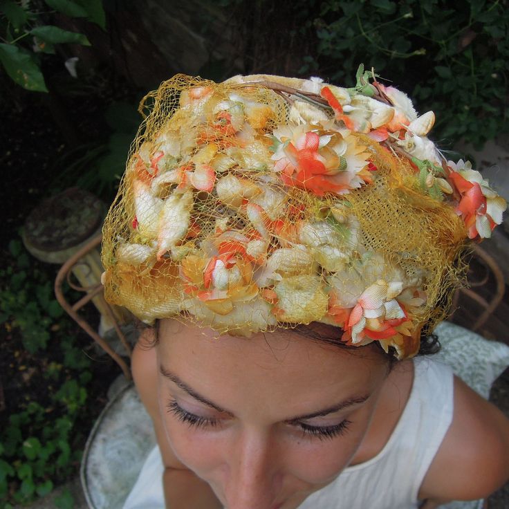 "Vintage Orange and Yellow Floral Hat 50s Chapette / Bandeau Style Floral Headband / Vintage Derby Fascinator Beautiful vintage bandeau style head piece with orange yellow and green velvet flowers and leaves. Pretty piece for a vintage wedding. The tulle is in worn and torn shape. The hat is in vintage condition. This does not take away from its vintage beauty. Wonderful for a collection as well. The beautiful model is my eldest daughter an accomplished photographer, wife and mother.  Measures a Headband Vintage, Eldest Daughter, Colorful Drinks, Derby Fascinator, Floral Hat, Velvet Flowers, Vintage Headbands, Floral Headband, Head Piece