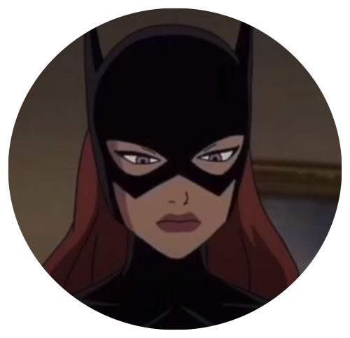 a woman with red hair wearing a batman mask