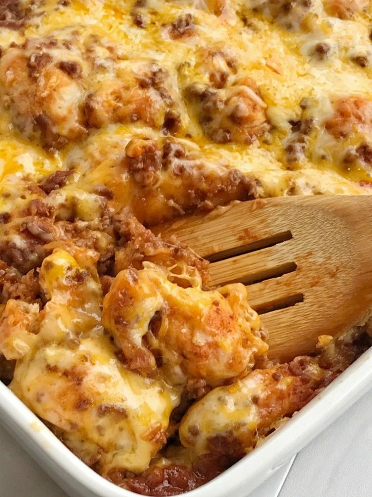 a casserole dish with meat and cheese in it, ready to be eaten