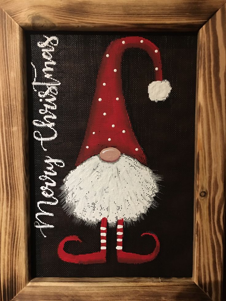 an image of a christmas gnome painted on canvas