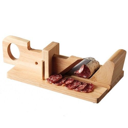 a cutting board with some meat on it