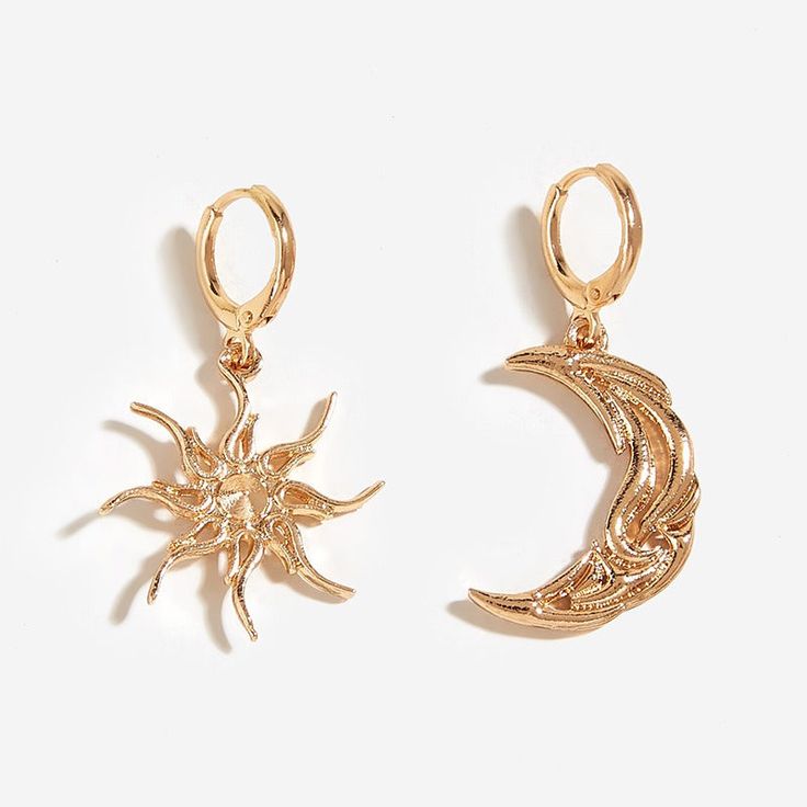 Add a bit of celestial sparkle to your ensemble with these Sun & Moon Magic Earrings! These mismatched earrings feature a crescent moon and a radiant sun, bringing a unique look to any outfit ✨ Magic Earrings, Sun And Moon Earrings, Asymmetric Earrings, Magical Design, Artsy Outfit, Black Earrings Dangle, Alloy Earrings, Mismatched Earrings, Moon Magic