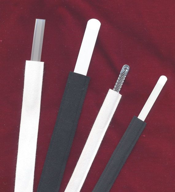 three different types of tooth brushes on a red cloth with black and white trims