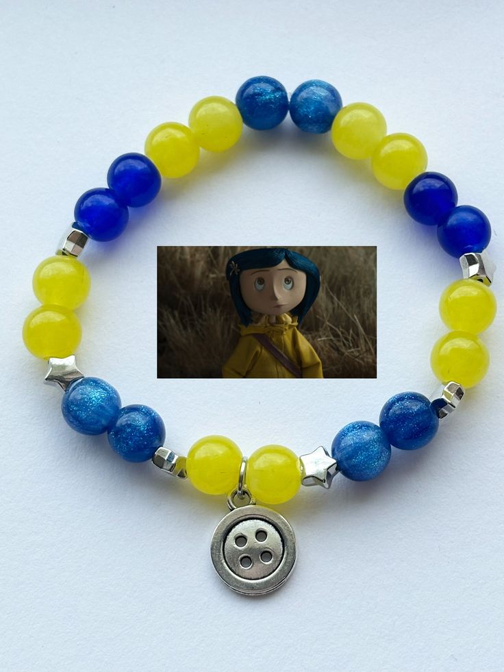 handmade beaded bracelets inspired by coraline Coraline Friendship Bracelet, Coraline Gift Ideas, Handmade Beaded Bracelets, Jasmine Birthday, Pony Bead Bracelets, String Bracelet Patterns, Birthday Basket, Kandi Bracelets, Clay Bracelet