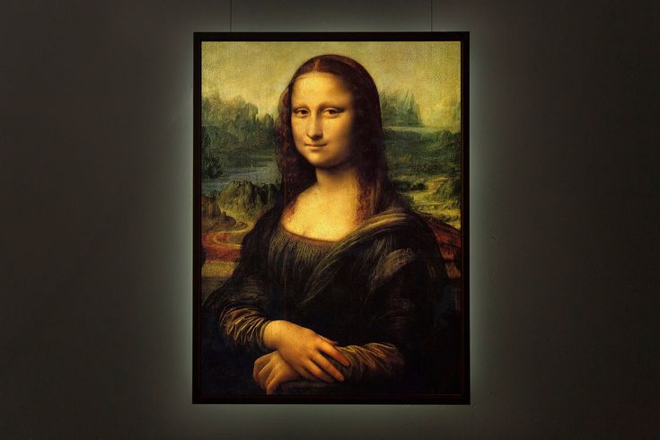 an image of the famous monaine painting hanging in a dark room with light coming from behind it