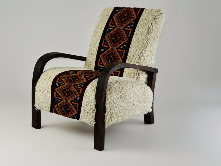 the chair is made out of sheep's wool and has a pattern on it