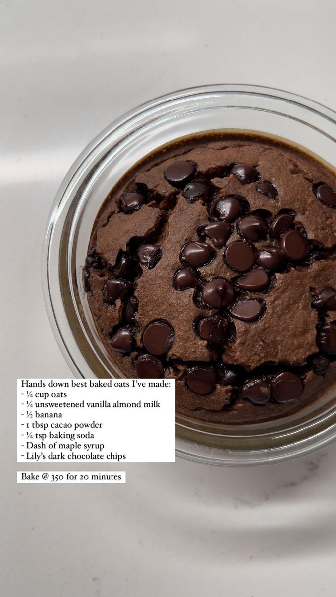 a chocolate cookie in a glass bowl on top of a white table with words describing it