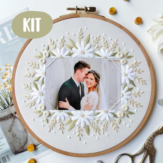 an embroidery kit with a picture of a bride and groom