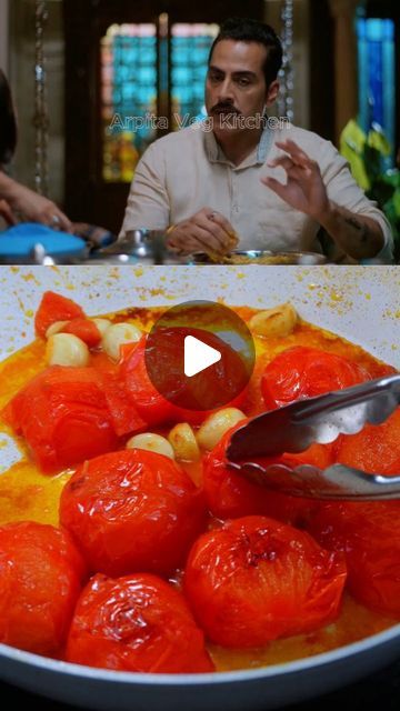 a bowl full of tomatoes being spooned into sauce by a man sitting at a table