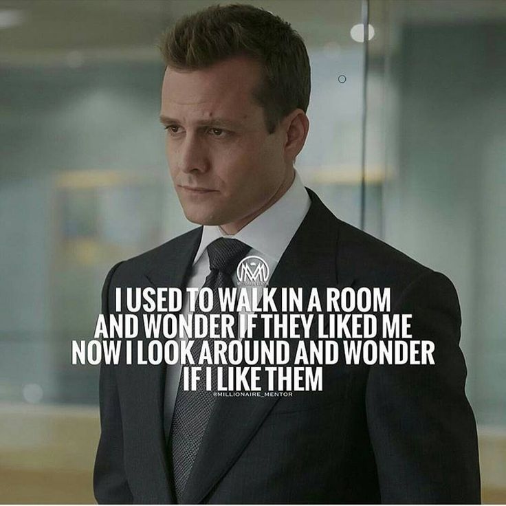 a man in a suit and tie looking at the camera with a quote on it