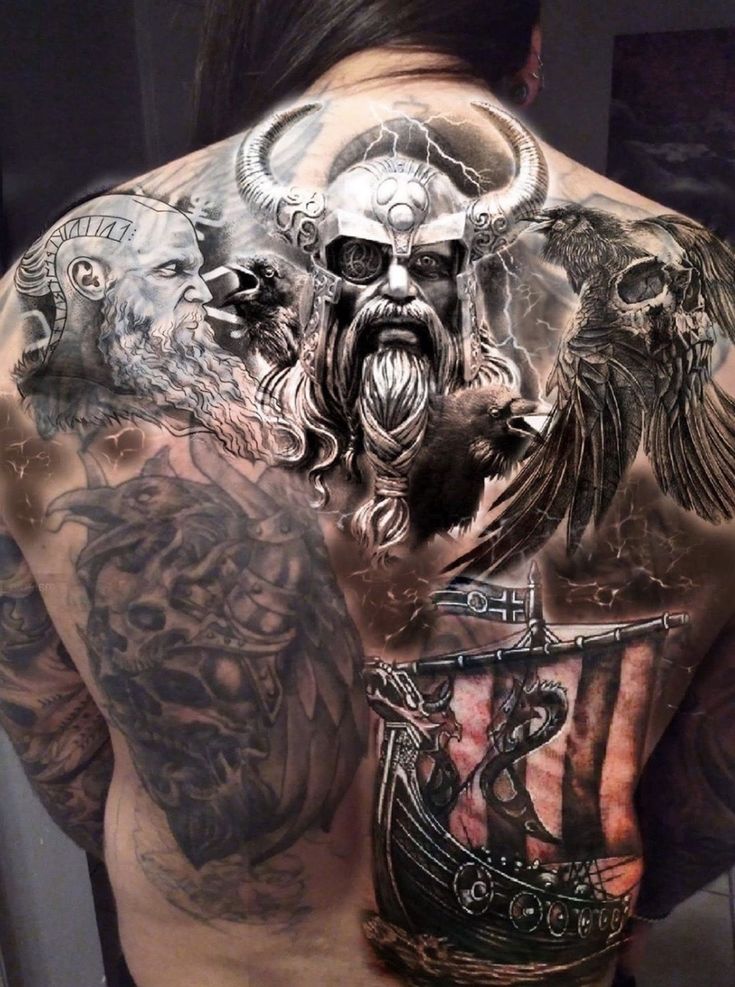 the back of a man with tattoos on his body and chest, all covered in different designs