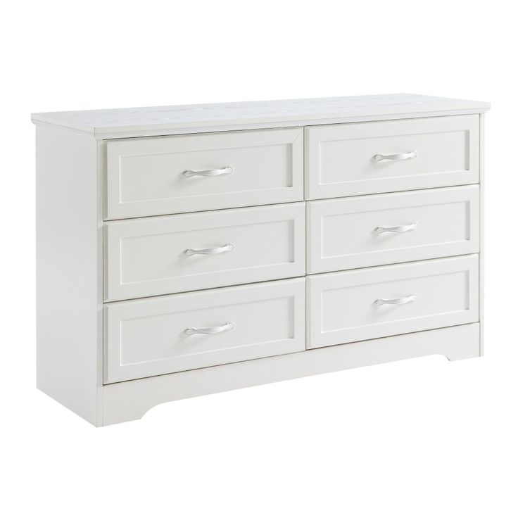 a white dresser with six drawers