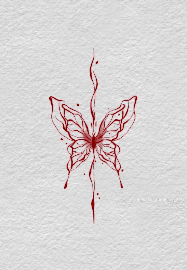 a drawing of a red butterfly on white paper