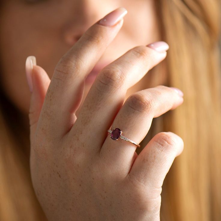 Natural ruby ring made in 14k or 18k rose gold and set with diamonds on the side. This ring is also suitable for anniversaries, gifts, or any other special occasion. This listing is for ROSE GOLD. you can order other colors from the following links: ● Yellow gold - www.etsy.com/il-en/listing/1066684973 ● White gold - www.etsy.com/il-en/listing/1054246238/ ♦ CENTER GEMSTONE SPECIFICATIONS ♦ Type: Ruby Shape: Oval Cut Carat Weight: 0.74ct Color: Purplish Red Clarity: VS ♦ SIDE DIAMONDS SPECIFICATI Rose Gold Diamond Birthstone Ring For Proposal, Rose Gold Ruby Ring With Halo Setting For Promise, Rose Gold 14k Diamond Proposal Ring, Fine Jewelry Rose Gold Diamond Proposal Ring, Rose Gold Diamond Ring For Proposal, Rose Gold Proposal Ring Fine Jewelry, 14k Rose Gold Ruby Promise Ring, 14k Rose Gold Ruby Ring With Prong Setting, Diamond Accented Ruby Ring In Rose Gold