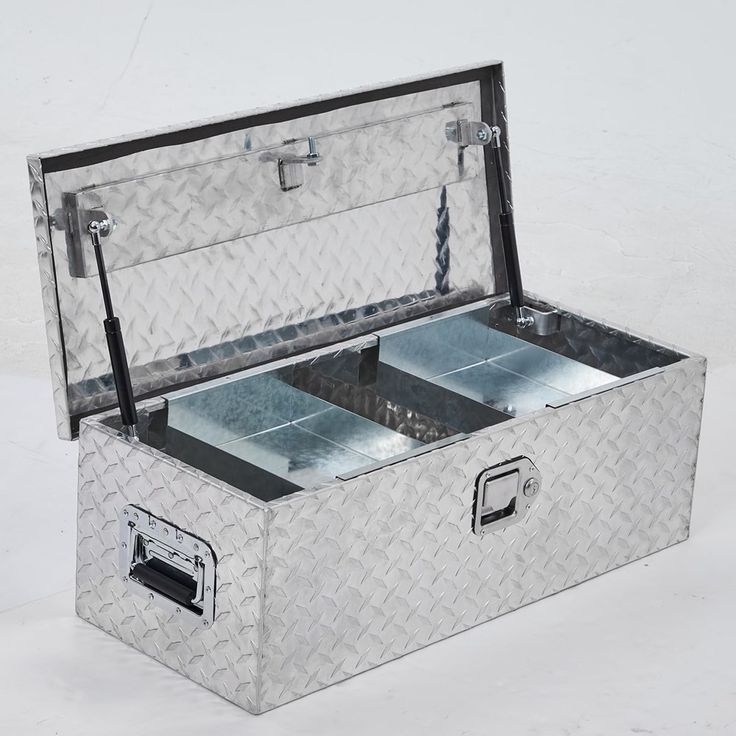 an aluminum storage box with two open compartments