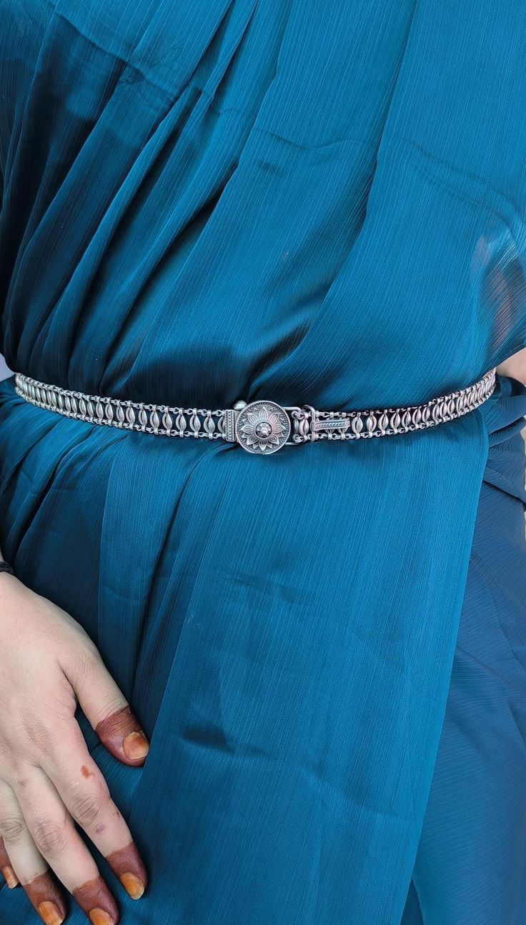 Buy new stylish wearable silver belt for girl's and  women's.  This stylish waist belt is and perfect outfit for anyone. Both unisex can buy and used this waist belt. This is also an kamarbandh,tagdi,kamar-peti, kardhani, mekhla.  This is highly oxidised and beautifully crafted stylish waist belt.  Details  This is an adjustable waist belt  You can adjust it's length with a adjustable hook( just need to lock it in design)  For Wear-  Open its lock and wear( lock near to charm) Weight - 168gm  Le Kardhani Design Silver, Waist Belt For Saree, Belt For Saree, Silver Waist Belt, Lock It, Hip Belt, Silver Belt, Silver Belts, Other Outfits