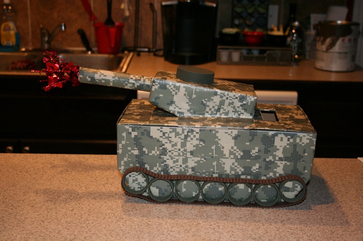 a toy tank sitting on top of a counter