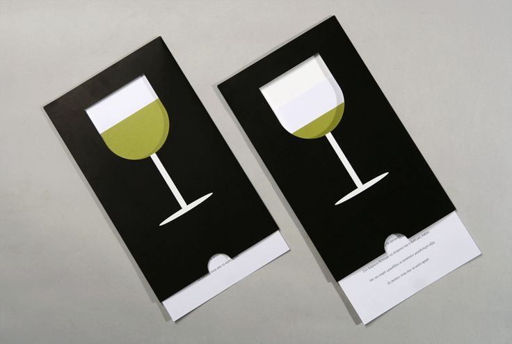 two black and white cards with green wine glasses on them, one for each card