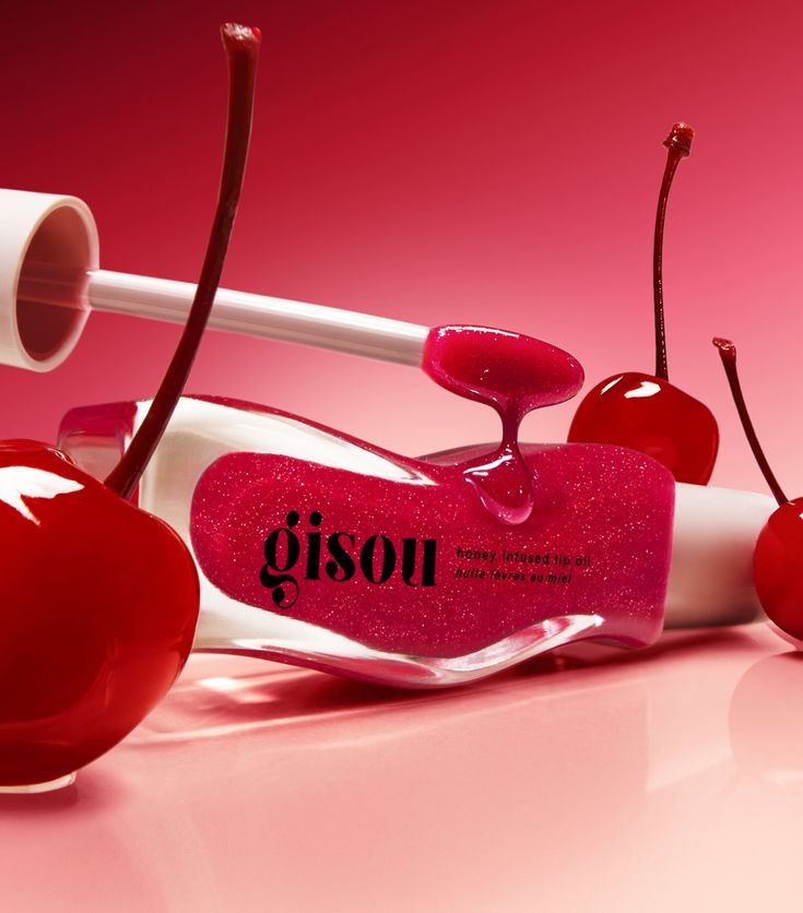 Gisou’s Honey-Infused Hydrating Lip Oil is powered by mirsalehi honey and bee garden oils, which help the formula to deeply hydrate dry lips and leave them with a flawless glossy shine. In a limited edition Cherry Cake fragrance and sheer red shimmer shade, this long-lasting lip oil will add extra dimension to lips, whether worn alone or over the top of your favourite lipstick. Honey And Bee, Hydrating Lip Oil, Cherry On The Cake, Business Photoshoot, Cherry Cake, Bee Garden, Lip Hydration, Dry Lips, Lip Oil