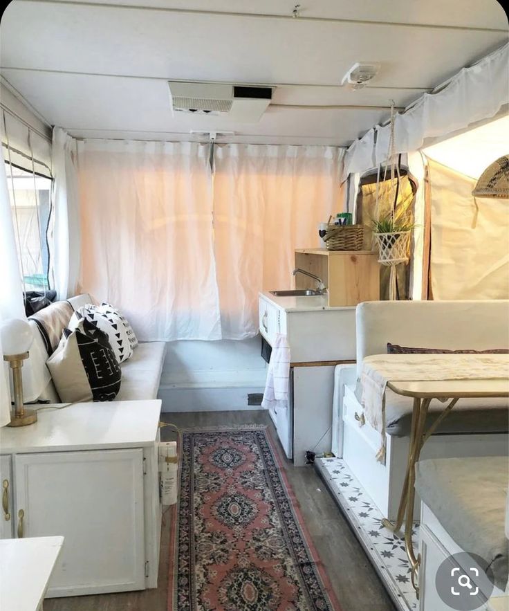 the interior of an rv is clean and ready to be used as a living room