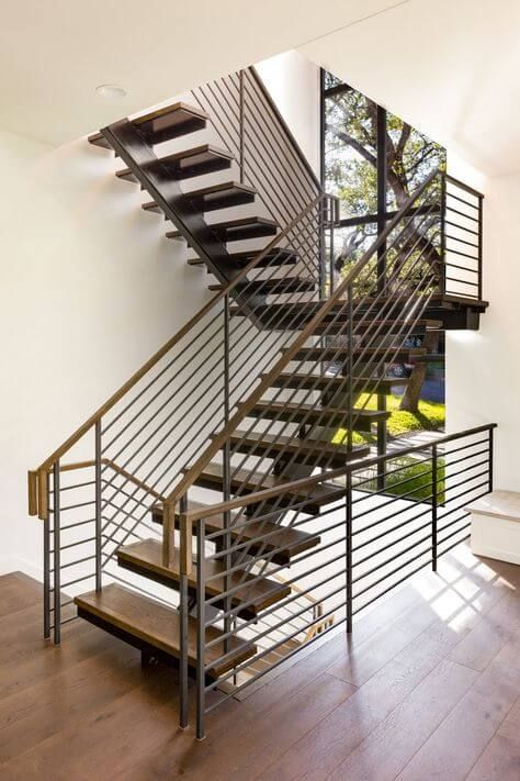 the stairs are made of metal and wood