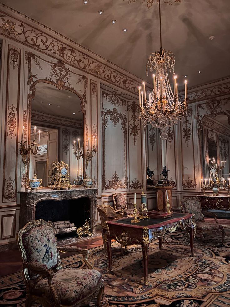 an ornately decorated living room with chandelier