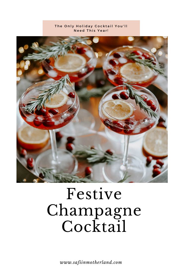 festive champagne cocktail with rosemary garnish on the rim and text overlay reads festive champagne cocktail