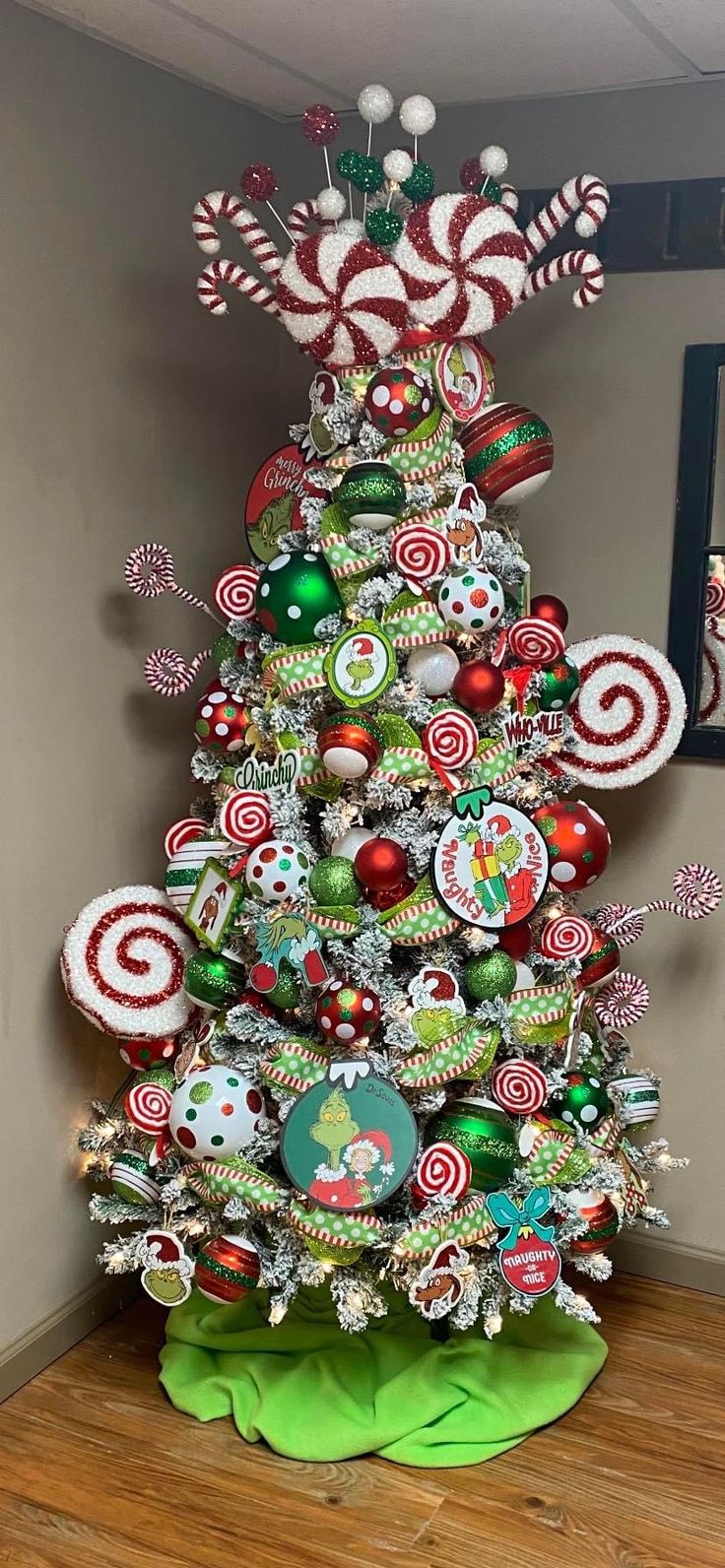 a christmas tree decorated with candy canes and candies